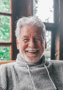 Closeup of senior man smiling at home