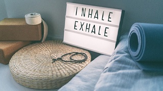White inhale exhale sign in relaxing spa setting