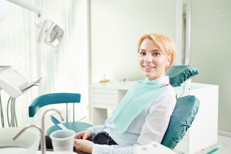 Dental patient smiling just before dental implant surgery